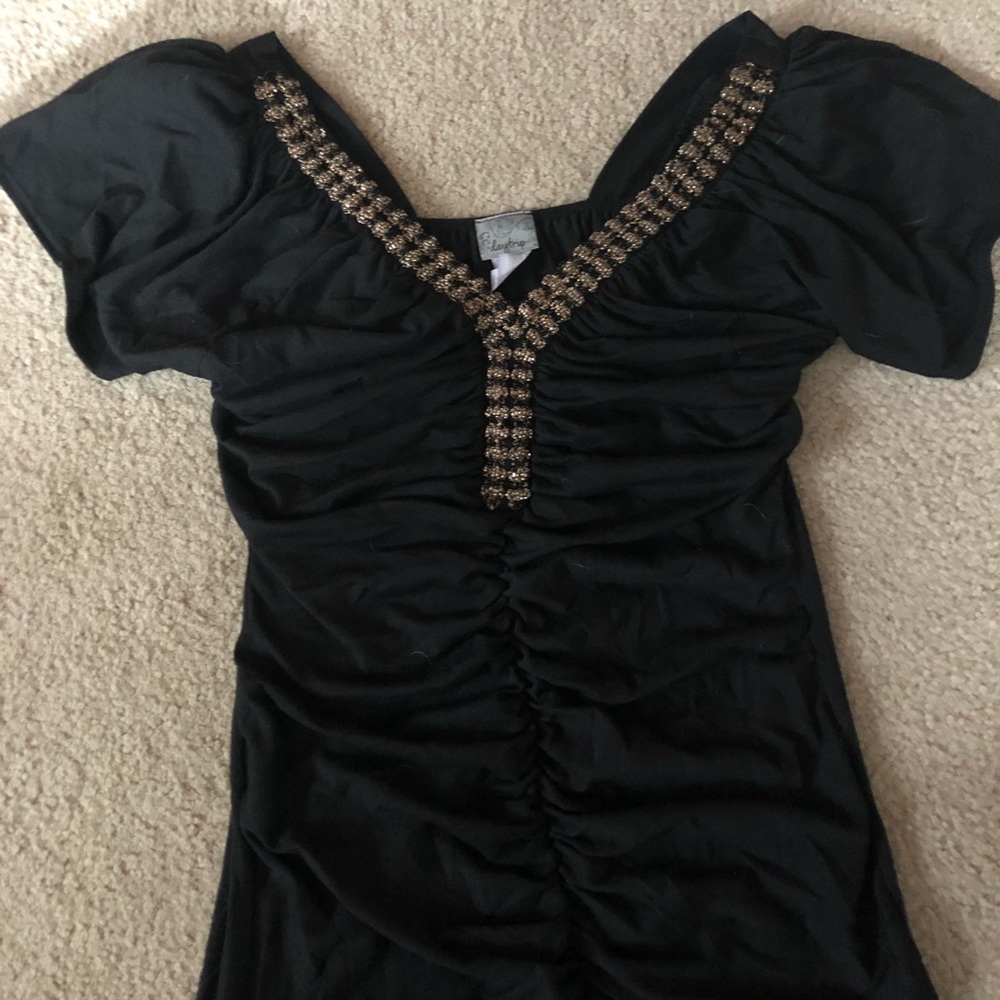 Sexy black & gold top! ✨🖤